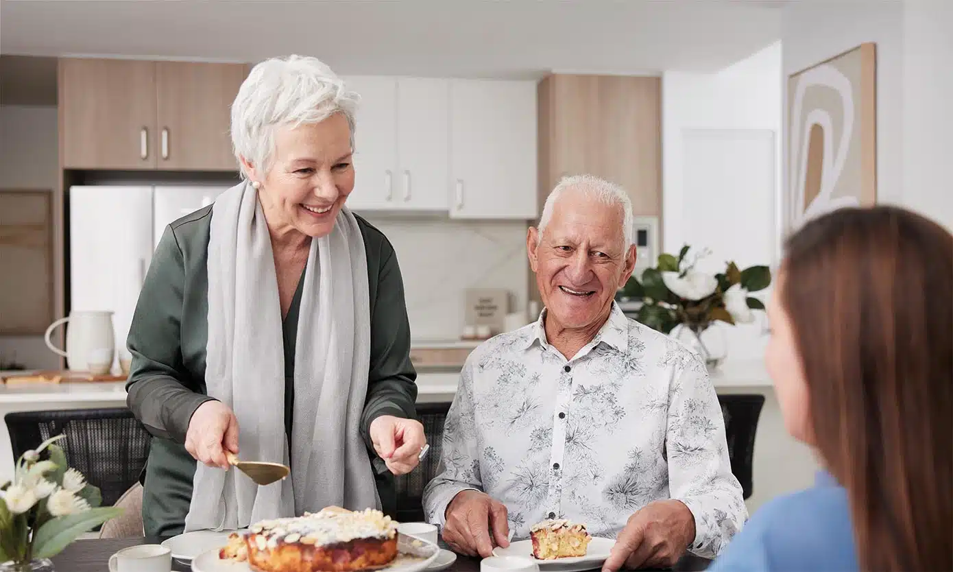 St Quentin Place - people enjoying a slice of cake and our fantastic lifestyle